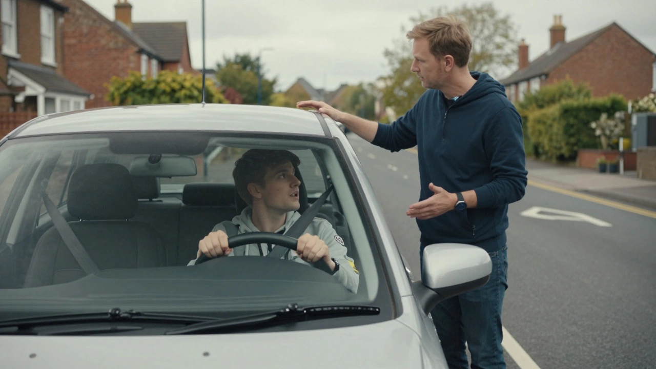 Learner driver receiving guidance from instructor in a dual-control car